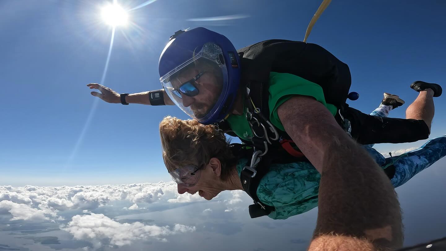 Tandem skydiving pair in freefall