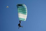 tandem skydiving pair under a RAM air parachute